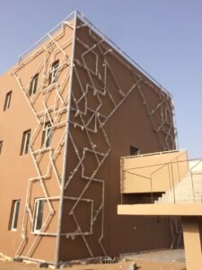 Building facade with geometric metal design