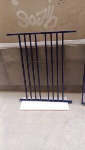 Metal grill barrier for window protection