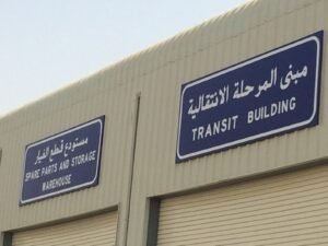 Navy base transit building exterior with signage